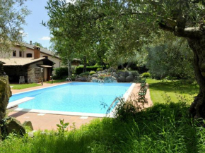 Quiet rustic farmhouse, surrounded by greenery, swimming pool with tennis court